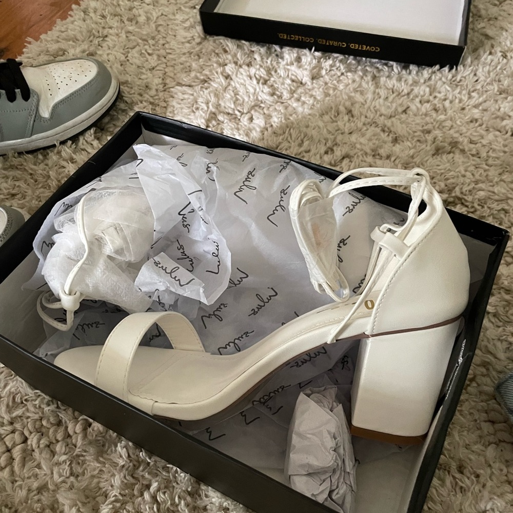 White strapped heels